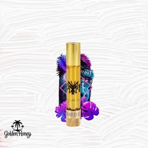 Muha Meds Cartucho Americano de 1ml, envase dorado con diseño vibrante y tropical de fondo.