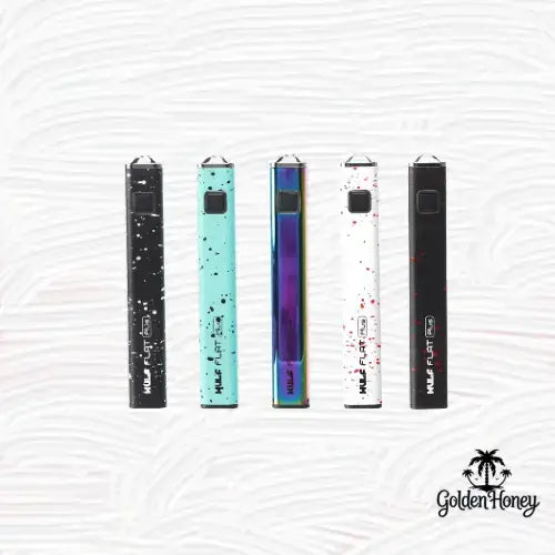 WULF FLAT PLUS batteries in various colors against a textured background, showcasing their sleek design.