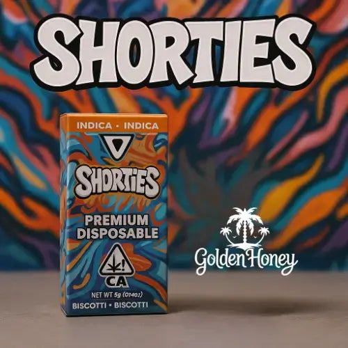 Shorties Premium Disposable device featuring colorful packaging, showcasing Indica Biscotti flavor, with branding by Golden Honey.