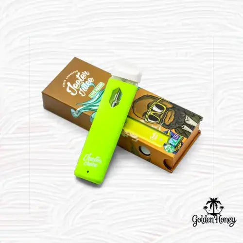 Jeeter Juice 2ML device in vibrant green with stylish box showcasing premium features.