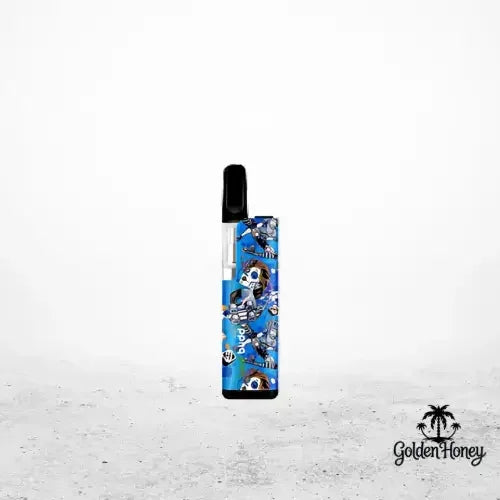 Batería Leaf Buddi TH720 con un colorido diseño de calaveras sobre fondo azul, perfecta para un uso personalizable.