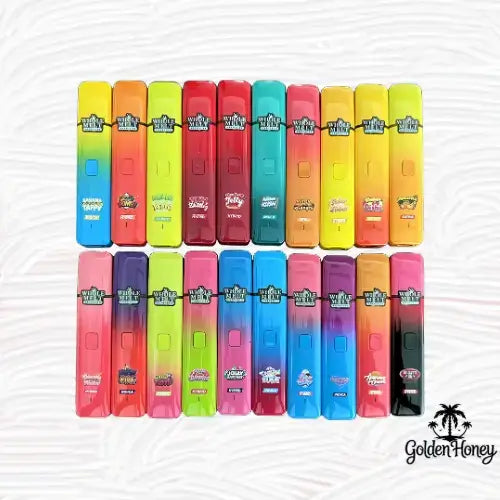 Variety of Whole Melt disposable devices in vibrant colors displayed together on a light background.
