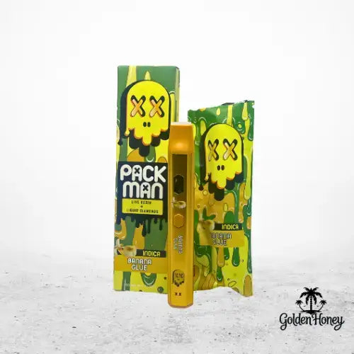 Packman Pen device in yellow with fruity packaging, featuring Banana Glue flavor and Indica strain, against a light background.