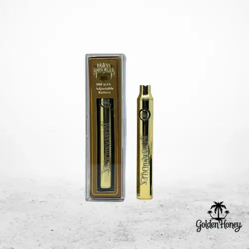 Batería ajustable Brass Knuckles de 900 mAh en embalaje dorado, que destaca por su elegancia y rendimiento.