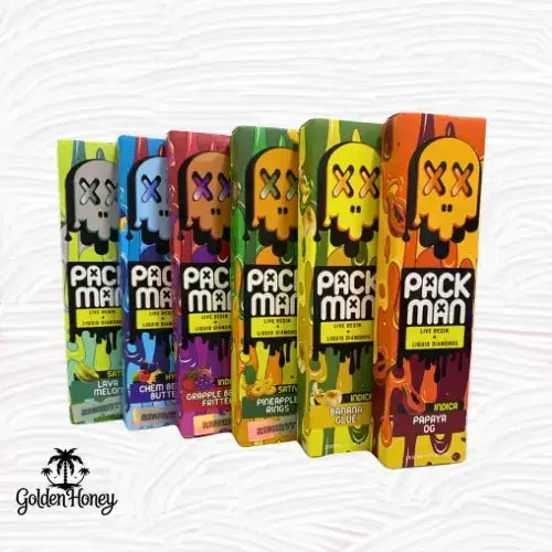 Variety of Packman vape pen boxes in colorful designs, featuring flavors like Lava Melon, and Papaya OG.