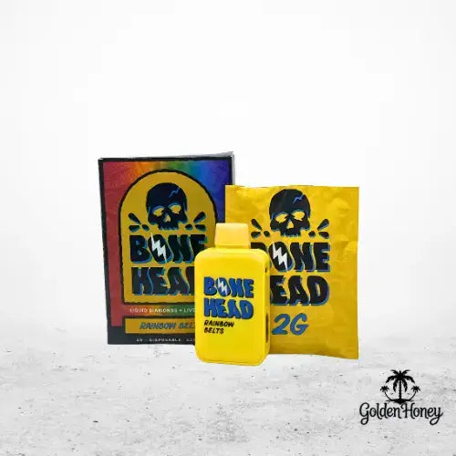 Bone Head device with packaging, showcasing Live Resin + Liquid Diamonds and 2G Rainbow Belts.