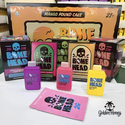 Bone Head Dispositivo Americano with colorful packaging and products, including Mango Pound Cake and Liquid Diamonds.