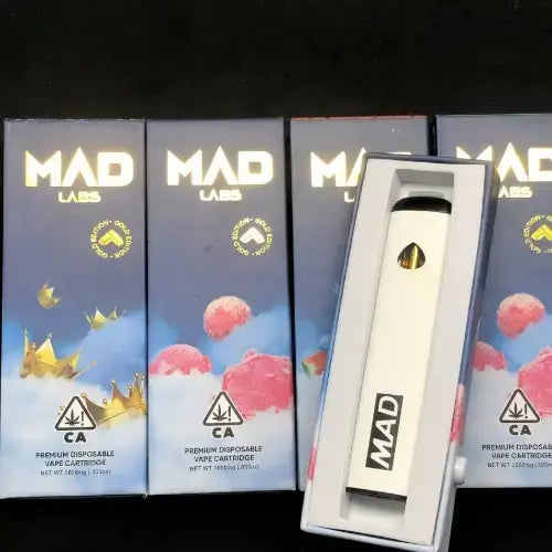 Mad Labs 1ML disposable vape device alongside colorful packaging, showcasing urban style and premium flavor.