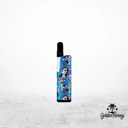 Batería Leaf Buddi TH720 con un colorido diseño de calaveras sobre fondo azul, perfecta para un uso personalizable.